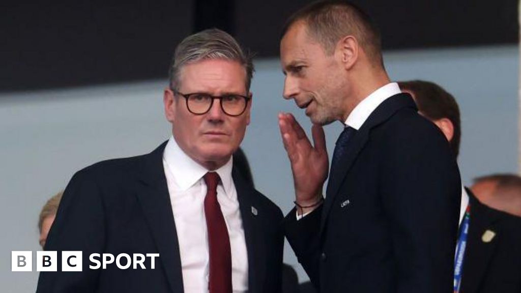 Sir Keir Starmer, Prime Minister of the United Kingdom and Leader of the Labour Party, speaks with Aleksander Ceferin, President of UEFA before the EURO 2024 final match between Spain and England