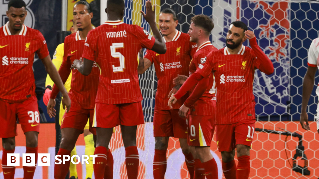 Liverpool's players celebrate after scoring against RB Leipzig in the Champions League