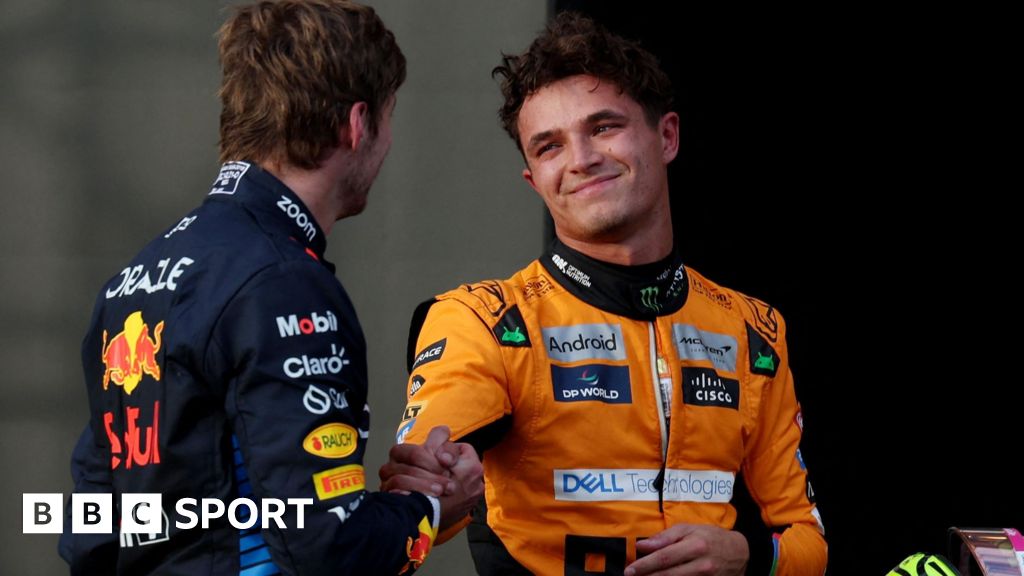 Lando Norris and Max Verstappen clasp hands after qualifying for the United States Grand Prix